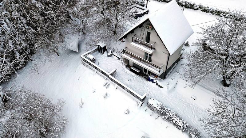 The property under snow from above